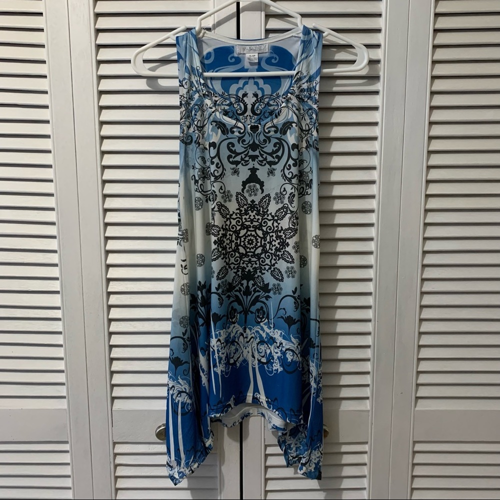 Magazine Sleeveless Top